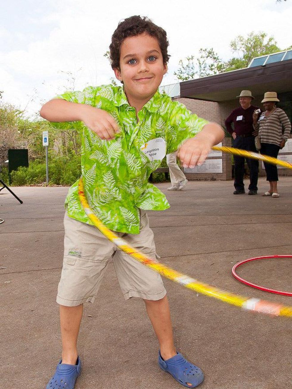 57, Texas Children's Ambassadors party April 2013 Leighton Sillitoe with hoola-hoop