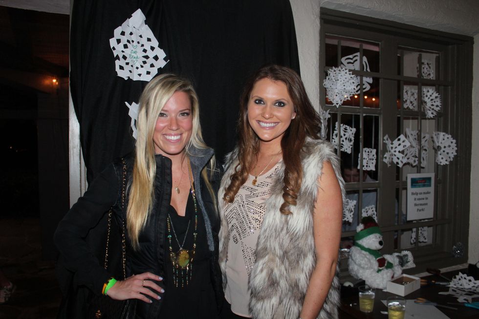 59 Holly Smith, left, and Lana Skinner at the Herman Park Conservancy Ski the Green party November 2013