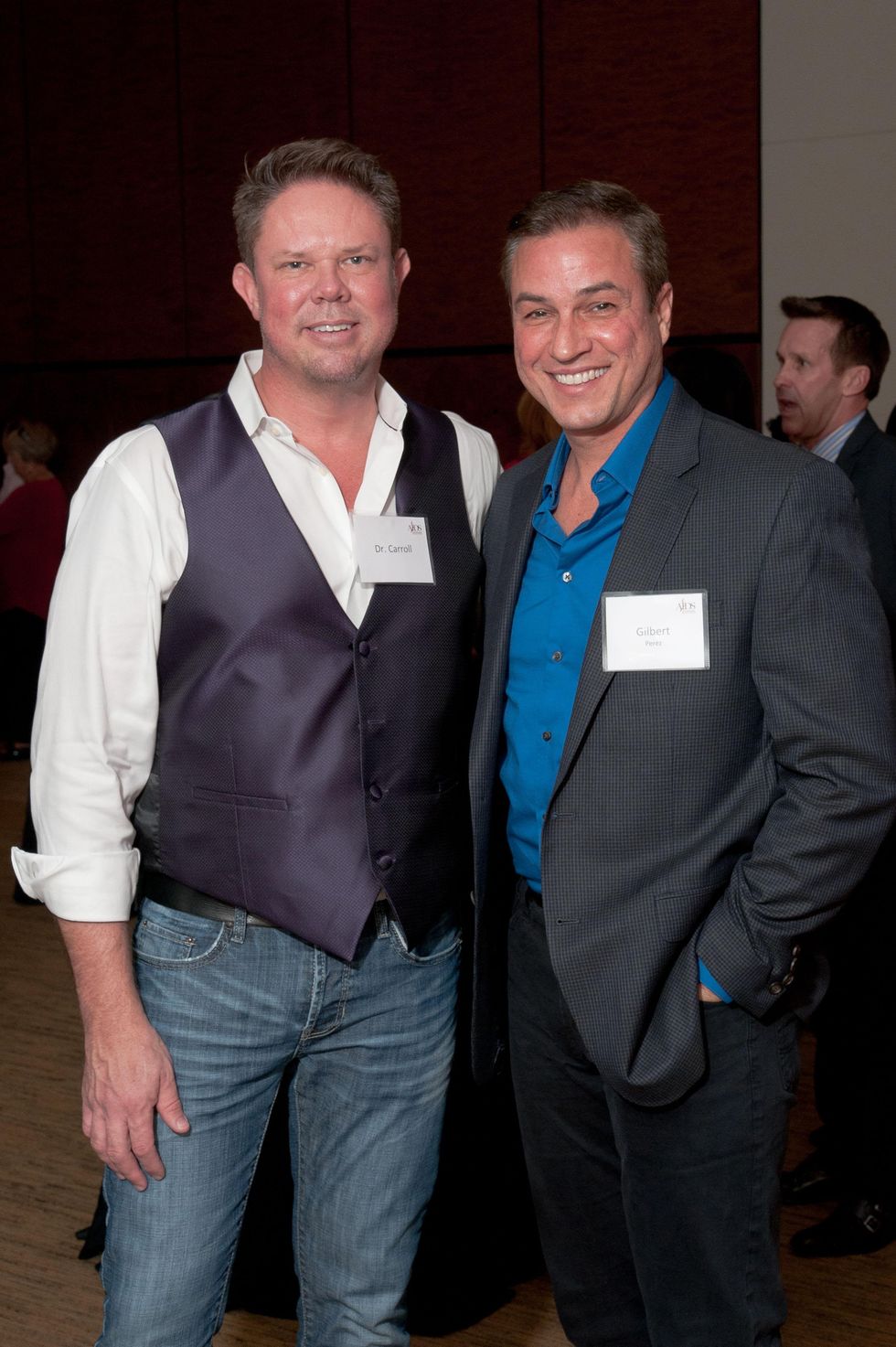 6 Dr. James Carroll, left, and Gilbert Perez at the World AIDS Day kick-off October 2014