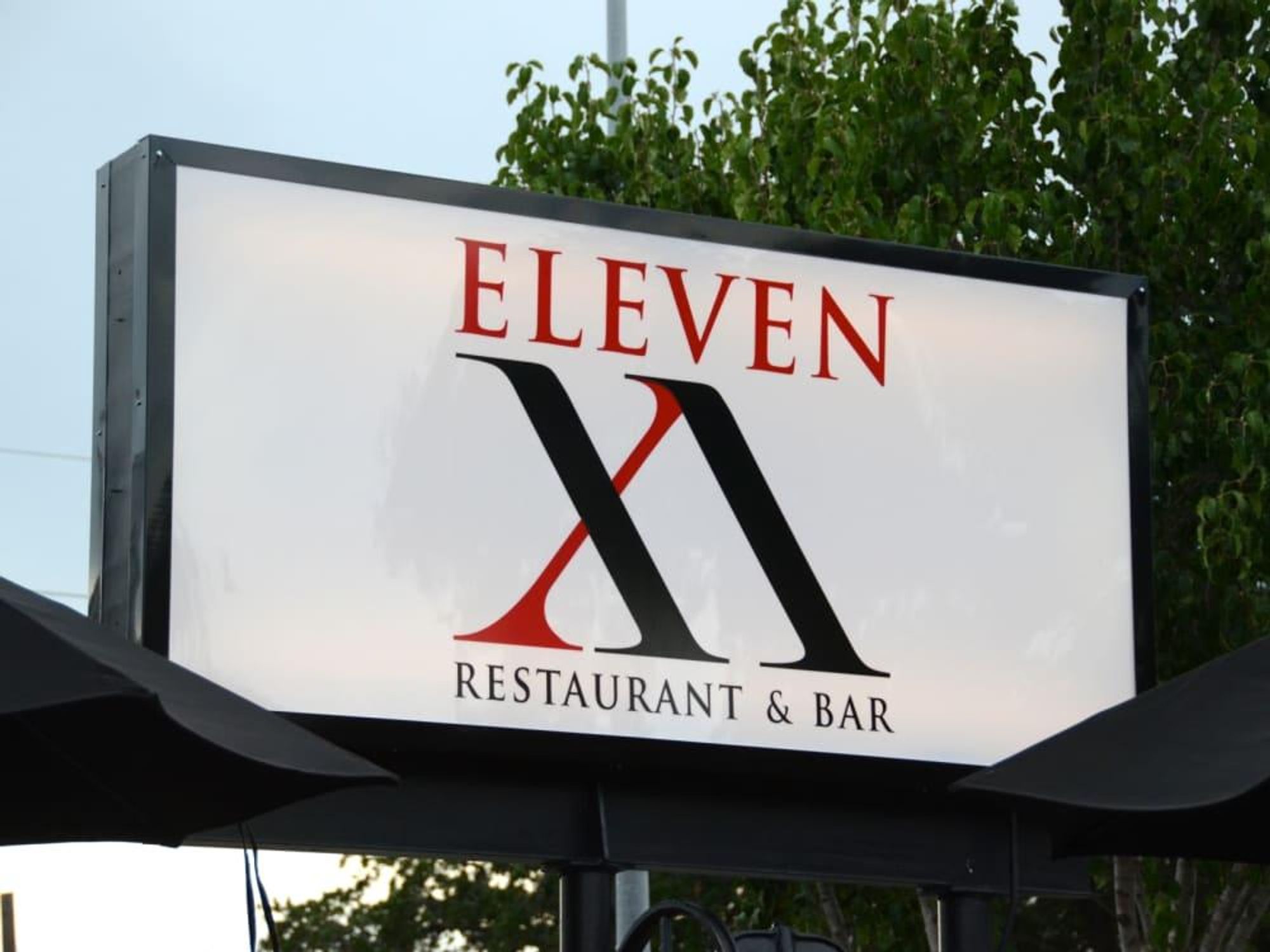 6 Eleven XI restaurant and bar sign
