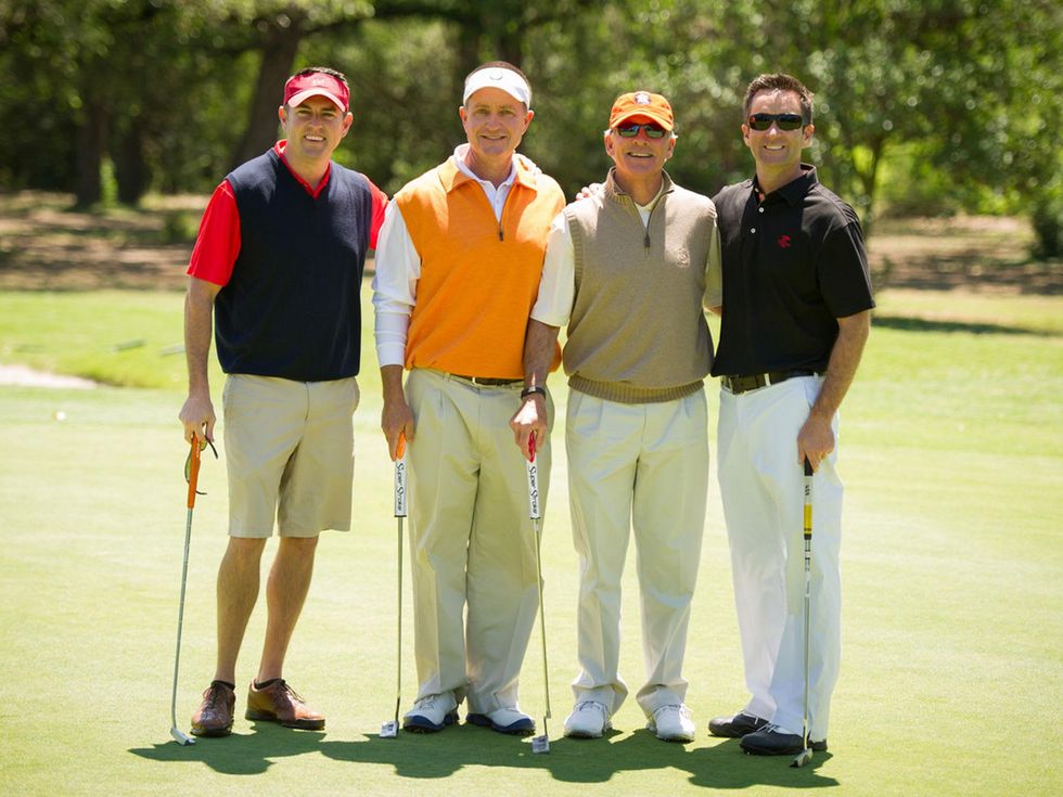 6 Jason Ellis, from left, Rob Schanen, Jimmy Burke and Sean Waggoner at the Children's Museum Spring Golf Classic April 2014