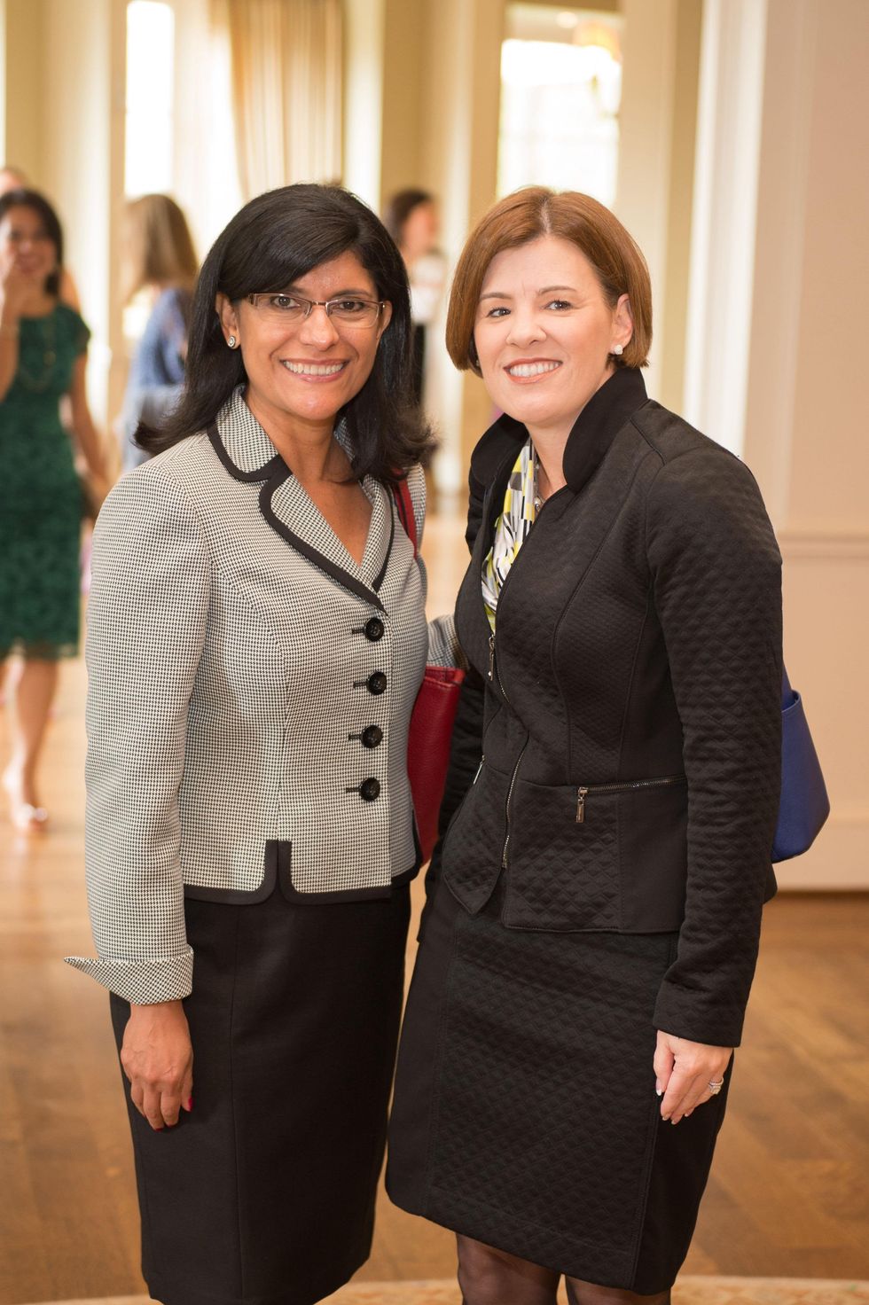 6 Lupe Mirales, left, and Lisa Barksdale at the Children's Museum Friends Families Luncheon March 2015