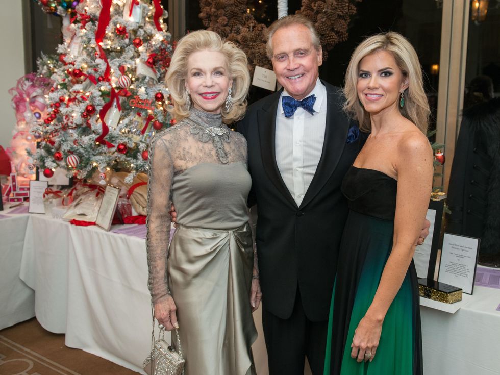 6 Lynn Wyatt, from left, with Lee and Faith Majors at the Trees of Hope Gala November 2014