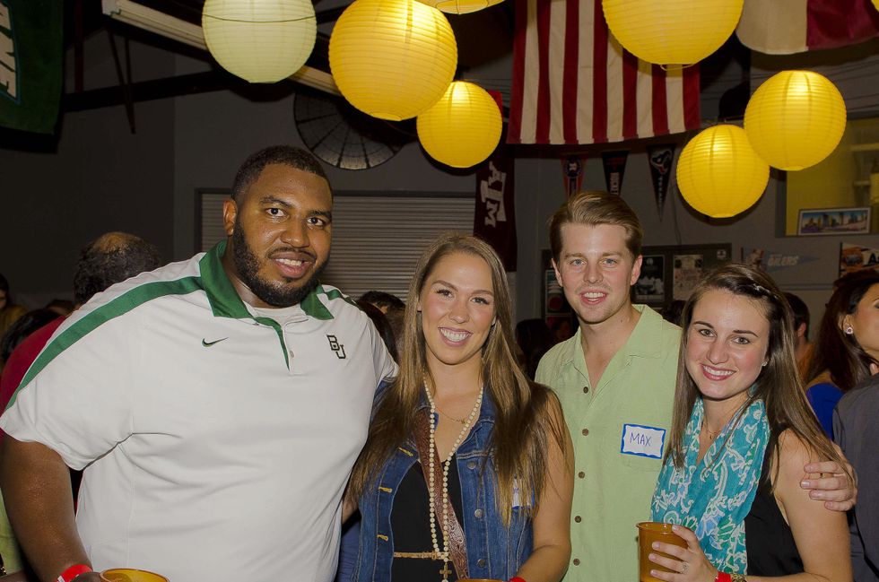 6 Nick Jean-Baptiste, from left, Disney Hanka, Max Harris and Alex Richoux at the Bear Bryant Awards young professionals party October 2014