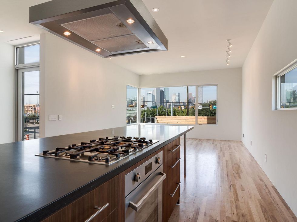 6 On the Market 3000 Hawkins St. December 2014 kitchen toward front of house Nov 3rd reshoot-8