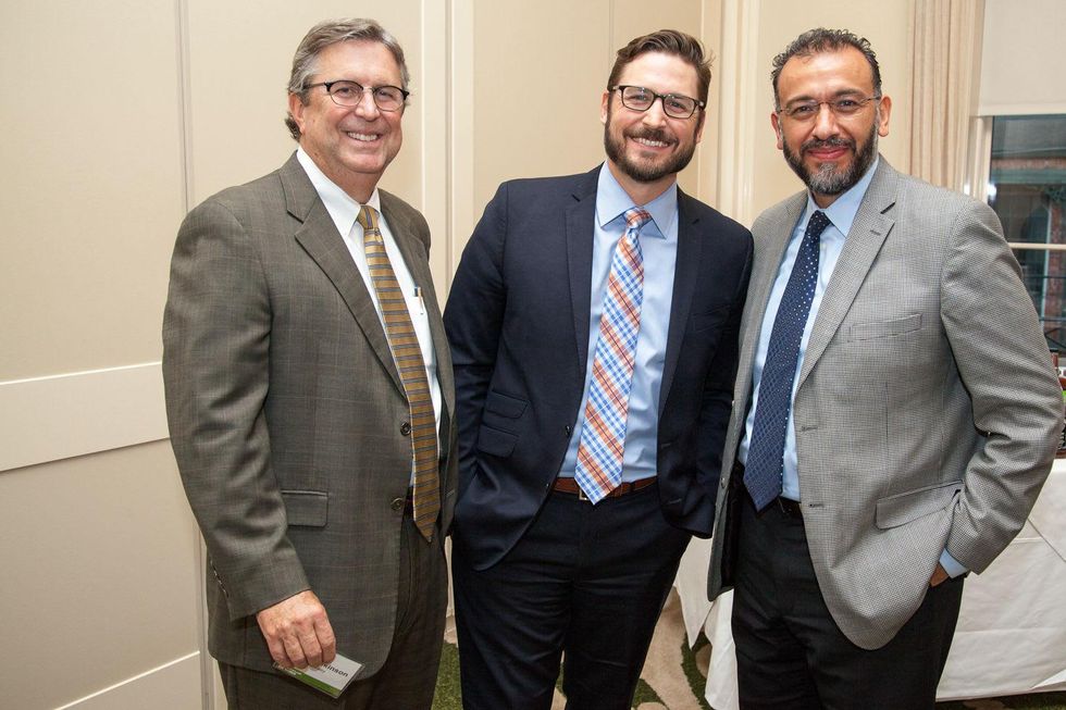 6 Scott Wilkinson, from left, Jason Tramonte and Arturo Chavez at the Urban Land Institute Houston mixer October 2014.