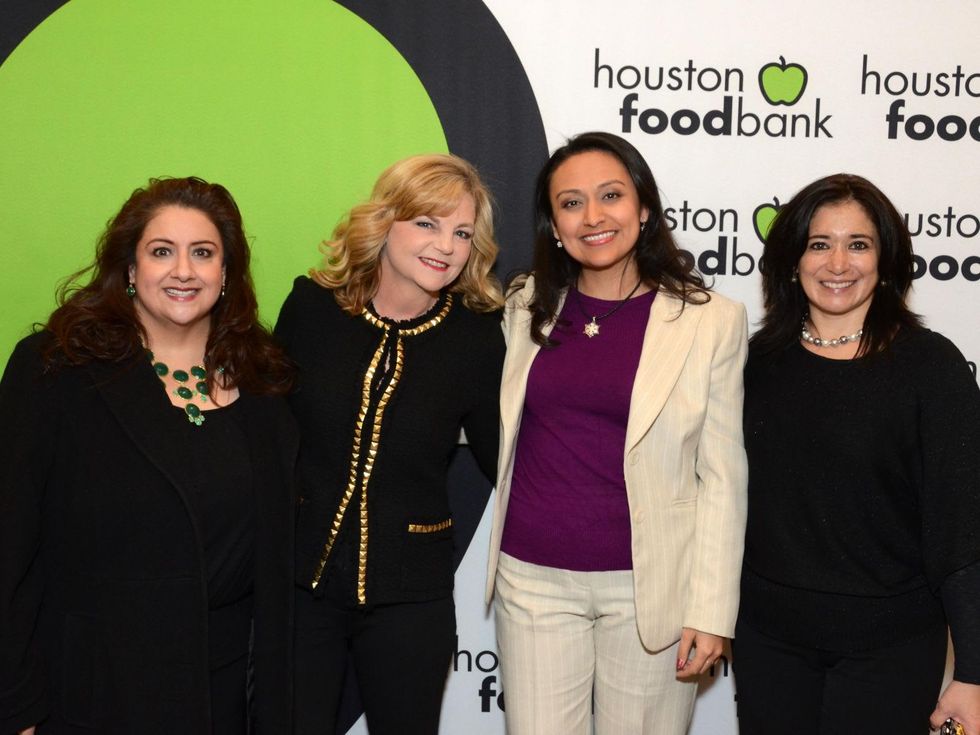 6 Sonia Soto, from left, Kim Padgett, Jessica Michan and Roxana Heredia at the mayoral inauguration reception at the Houston Food Bank January 2014