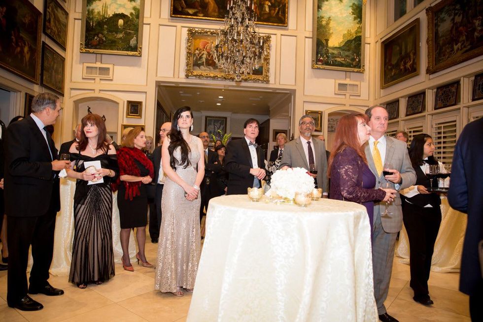 6 Touring the fab art work of the Gabels during the reception at the Houston Galveston Institute dinner November 2014