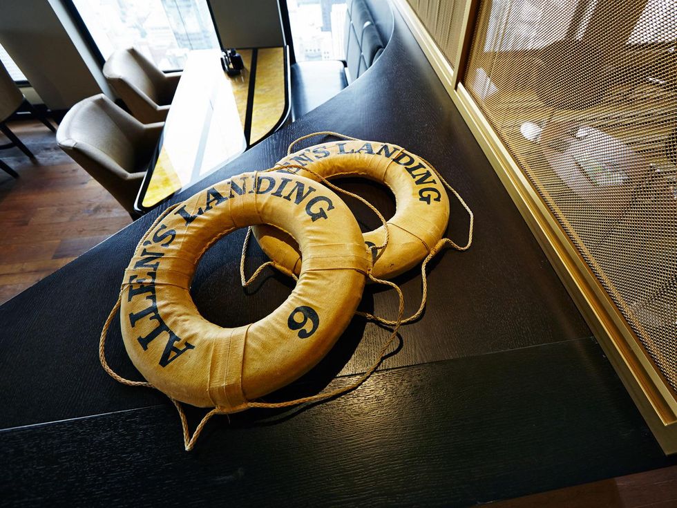 63 newly remodeled The Houston Club October 2013 bar with life floats