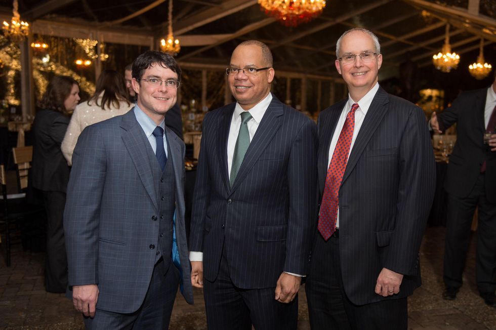 6945 James Chenoweth, from left, Felix Phillips and Mike Bresson at the Heritage Society Gala December 2014