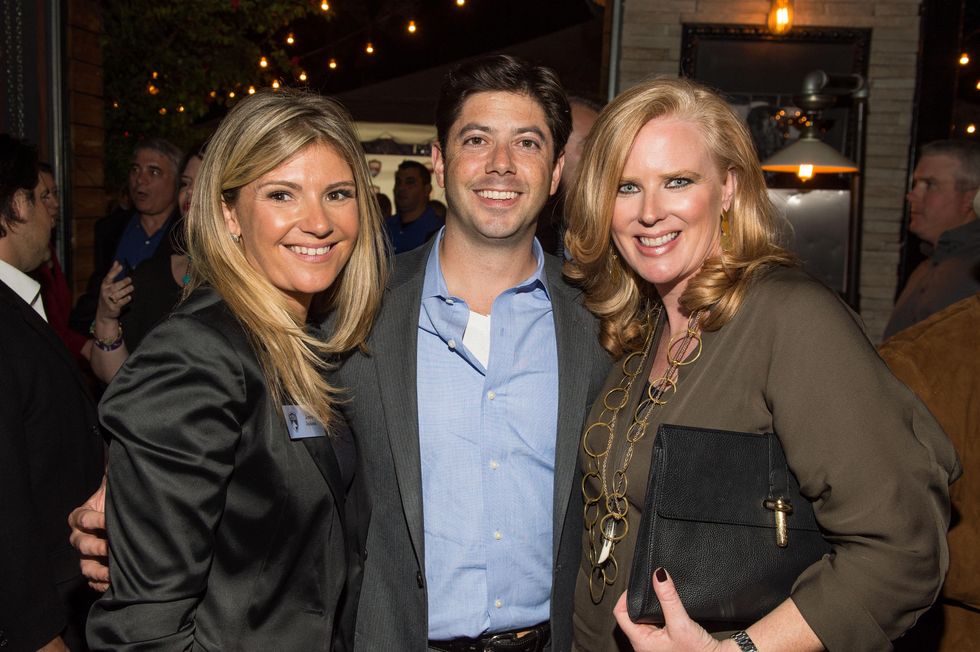 7 Jenna Jackson Gilbert, from left, Brendan Gilbert and Suzanne Droese at K9s4COPS Unleased 2013