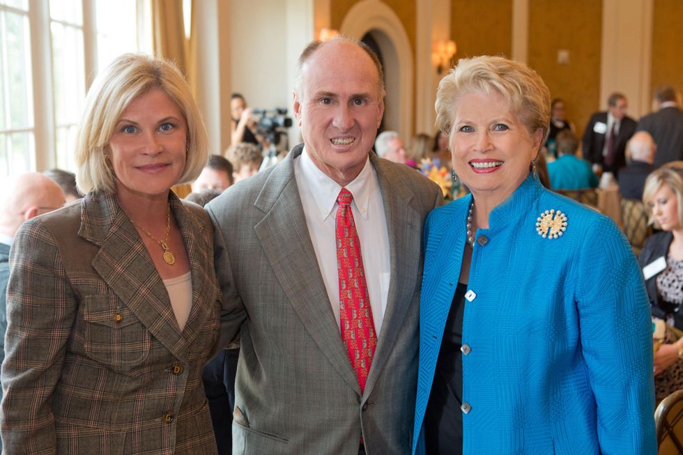 7 Kelli Blanton, from left, withn Eddy and Ginger Blanton at the Houston Methodist Luncheon September 2014