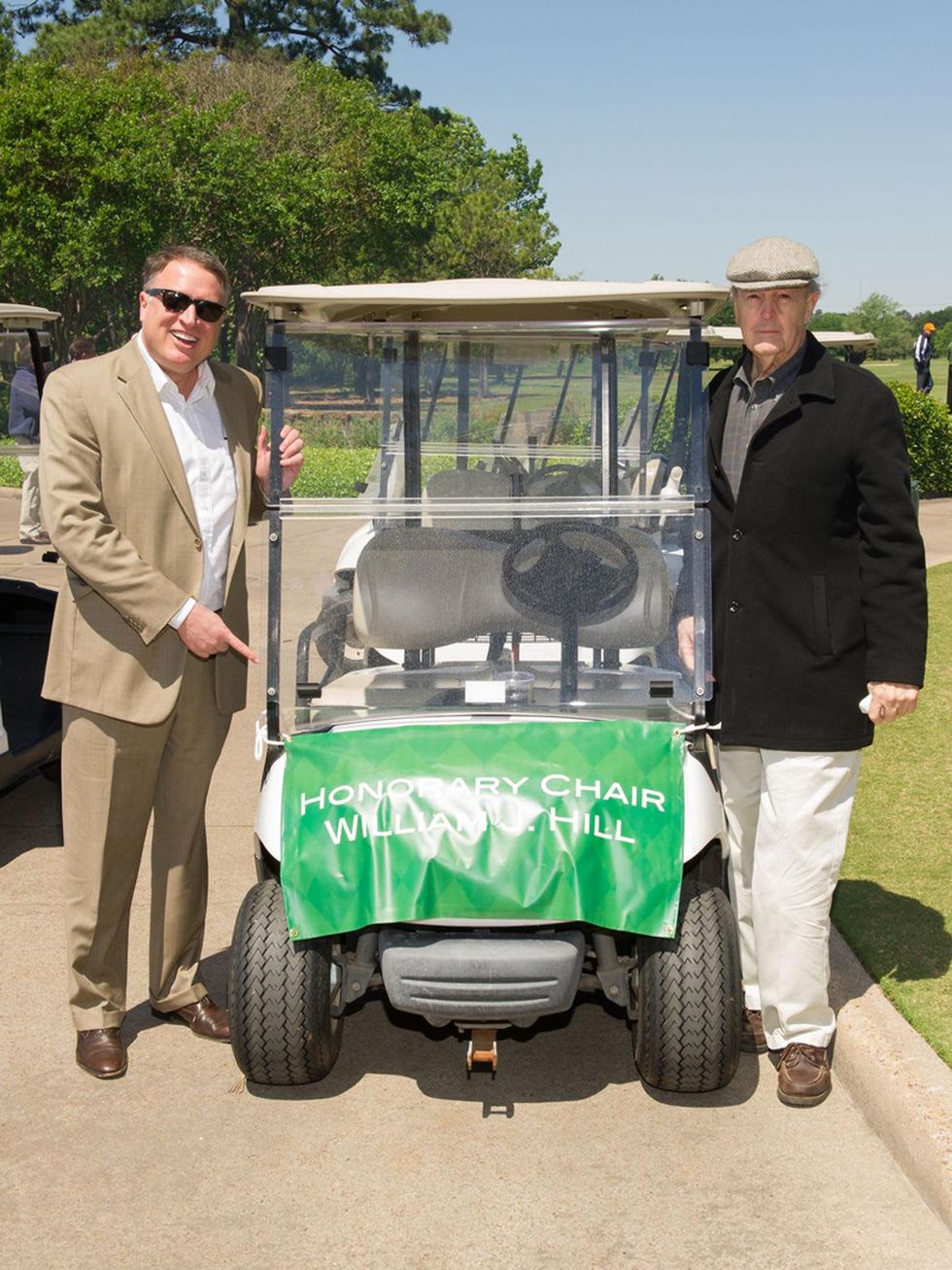 7 Marc Melcher, left, and William J. \u201cBill\u201d Hill at the Children's Museum Spring Golf Classic April 2014