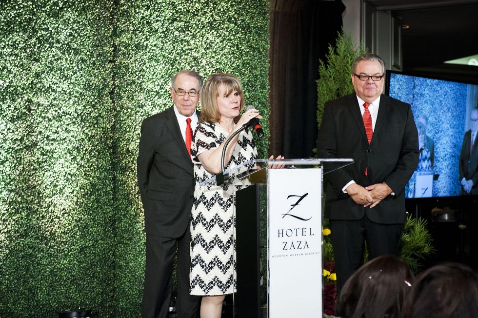 7547 Stephen Kaufman, from left, Anna Babin and Truman Bell at the Collaborative for Children dinner October 2014