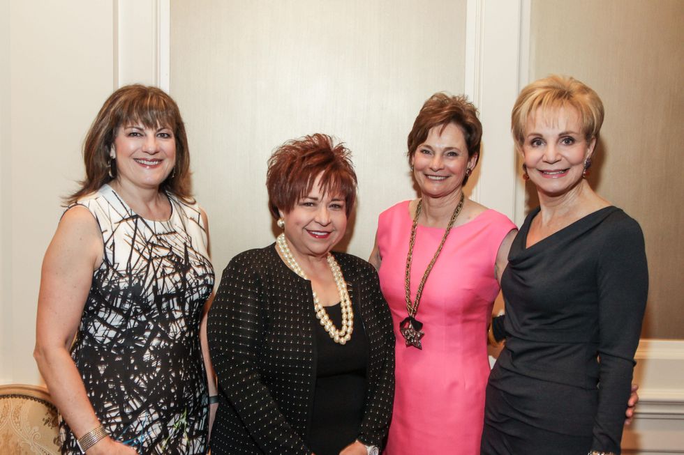 7787 Ellie Francisco, from left, Trini Mendenhall, Bobbie Nau and Leisa Holland-Nelson at the Mayor's Literacy Breakfast May 2014