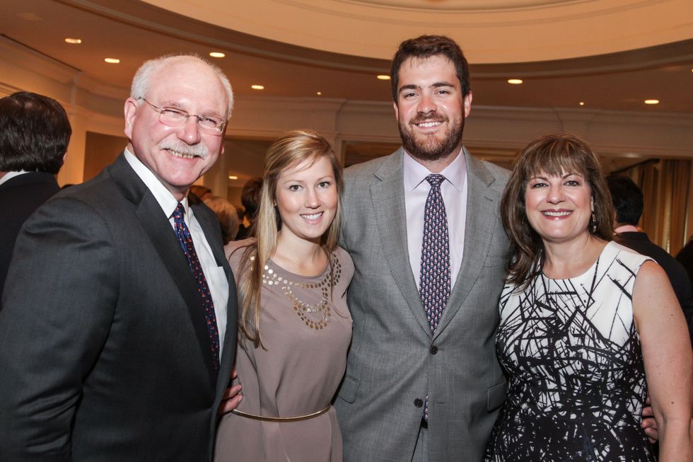 7847 Michael Francisco, from left, Liz Kennan, Gregg Ring and Ellie Francisco at the Mayor's Literacy Breakfast May 2014