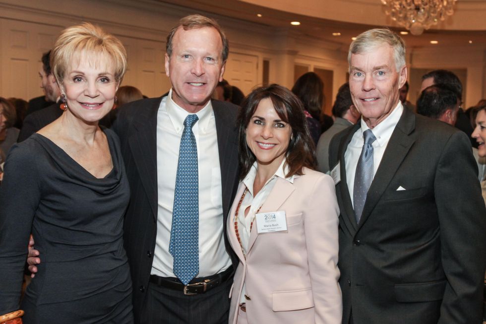 7852 Leisa Holland-Nelson, from left, Neil Bush, Maria Bush and Jack Christie at the Mayor's Literacy Breakfast May 2014