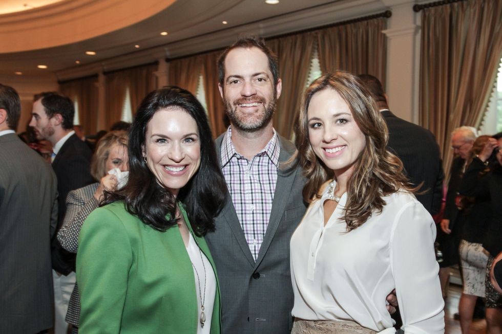 7854 Samantha Kennedy, from left, with Jeremy and Linsay Radcliffe at the Mayor's Literacy Breakfast May 2014