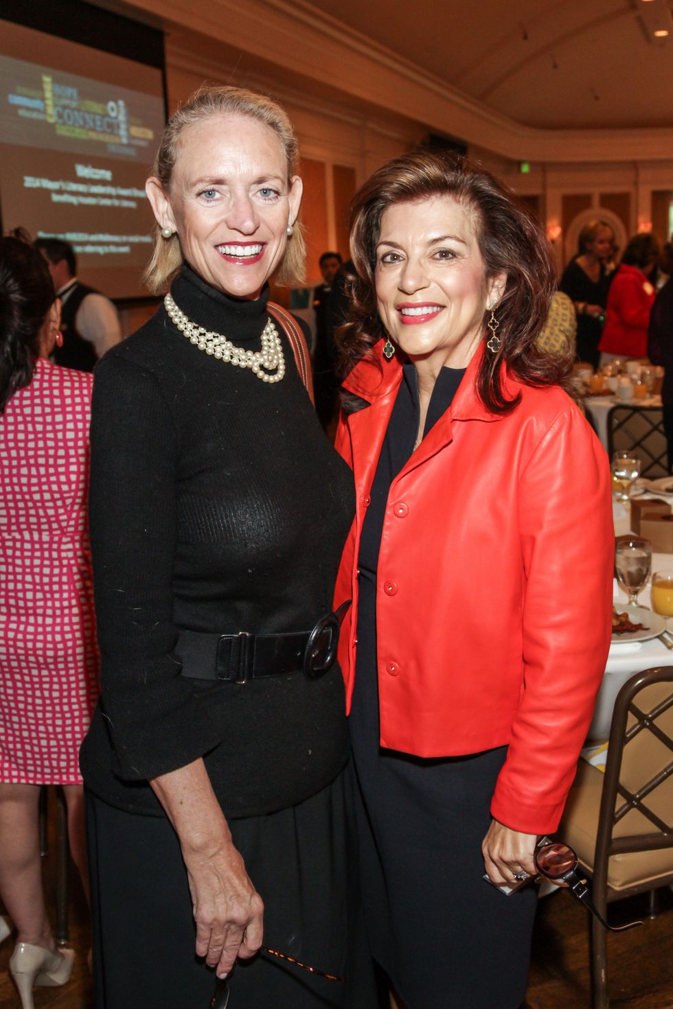 7906 Susie Peake, left, and Dancie Ware at the Mayor's Literacy Breakfast May 2014