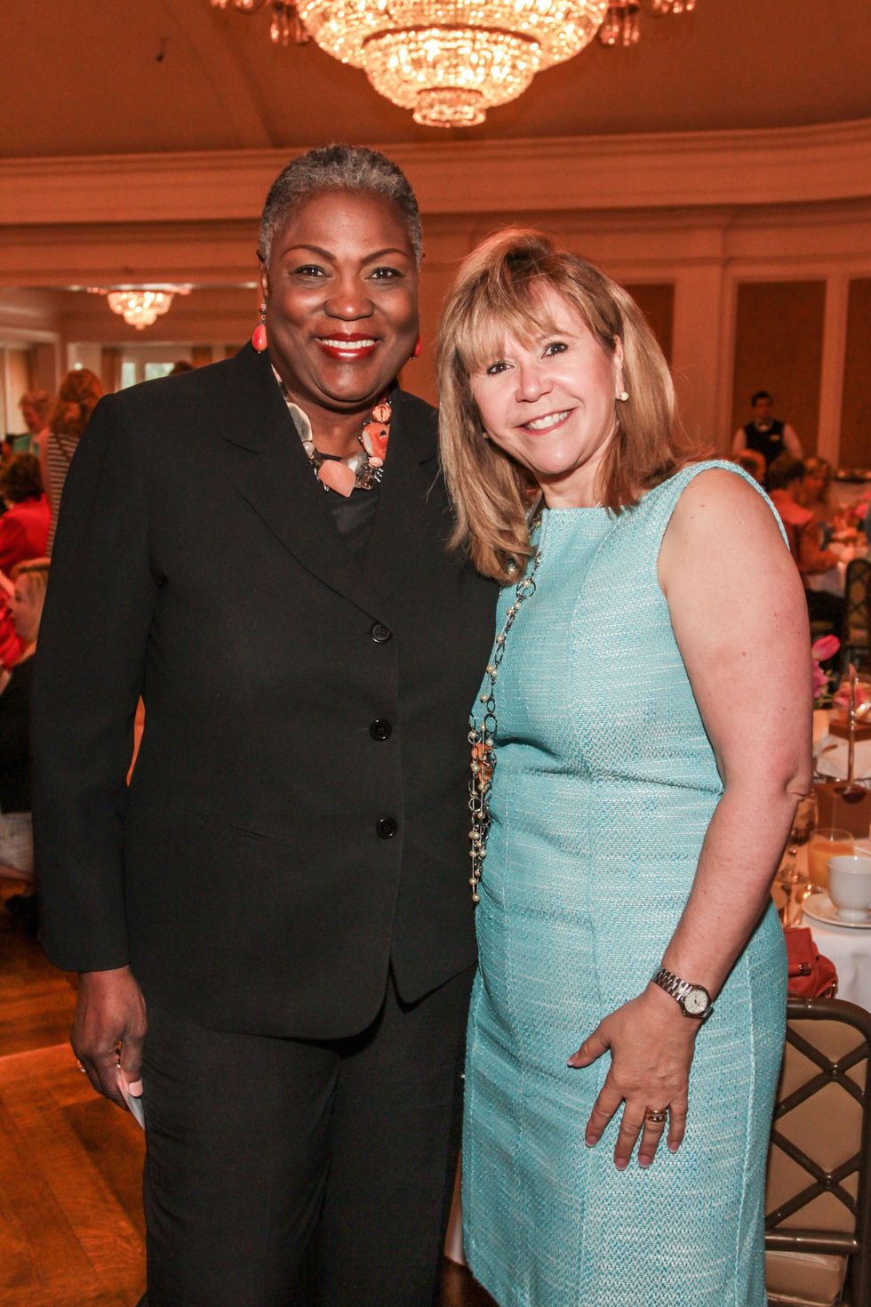 7936 Rhea Lawson, left, and Cyndy Garza Roberts at the Mayor's Literacy Breakfast May 2014