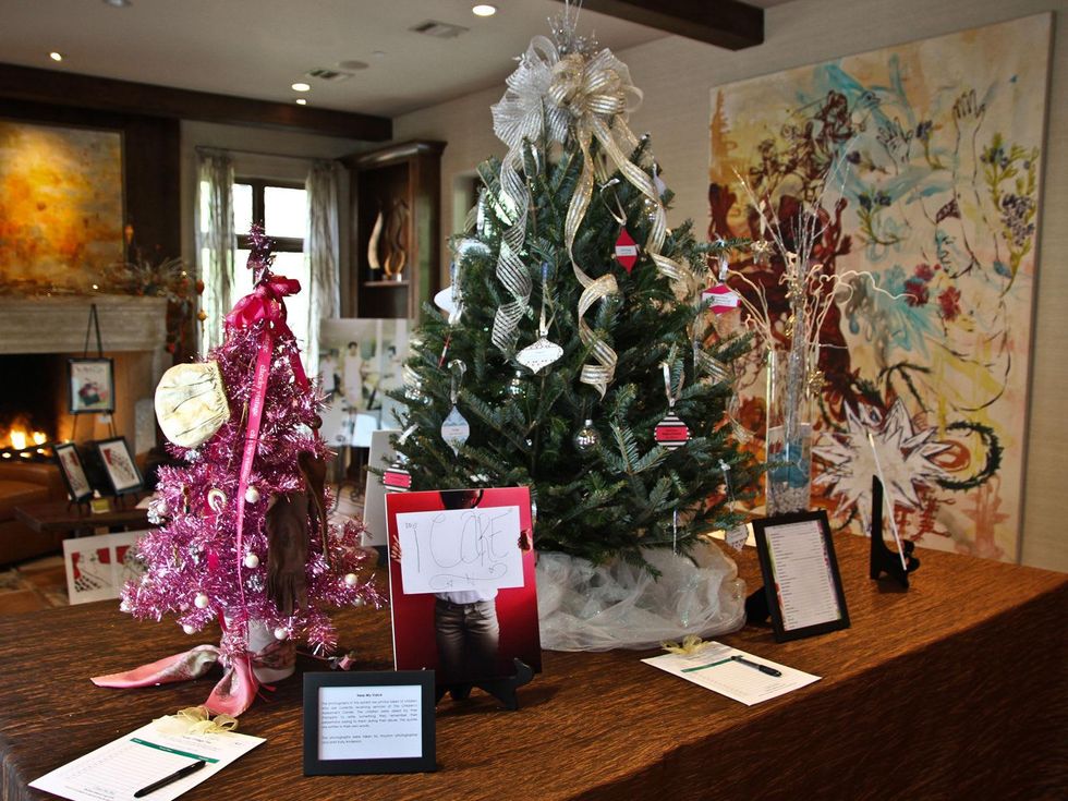 8 Auctioned holiday trees donated by Cheeky Vintage, Kendra Scott and Rice Village merchants at The Children's Assessment Center Holiday Coffee December 2013