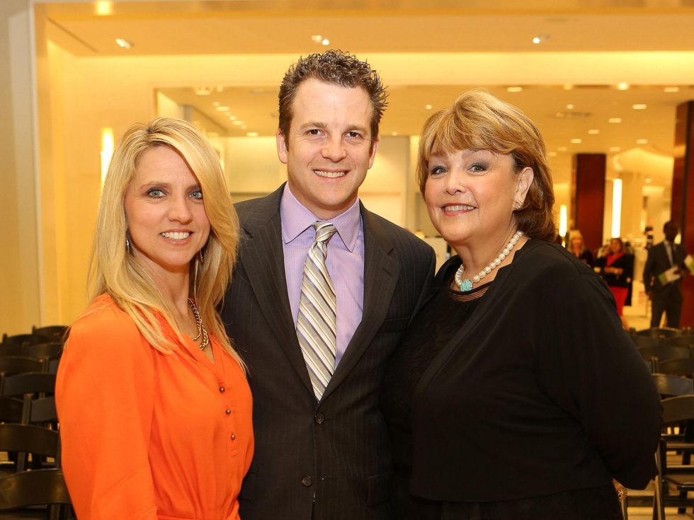 8 Heather and Jason Connelly, left, with Marilu Garza at Saks' Key to the Cure October 2013