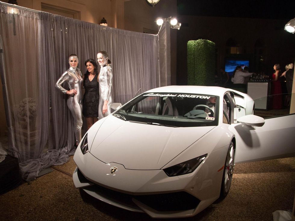 8 IndiGo girls with Hurac\u00e1n at the Lamborghini party September 2014