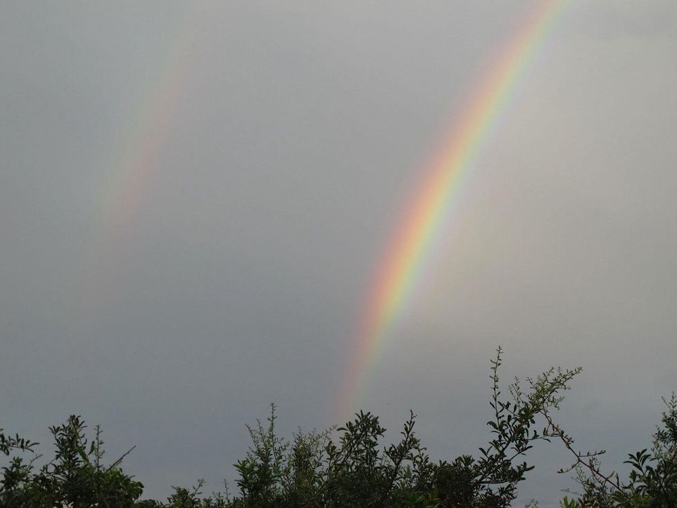 8. Katie Oxford sunsets August 2014 \u201cThere\u2019s more.\u201d (Somewhere between the sunset and the supermoon - a double rainbow is working).