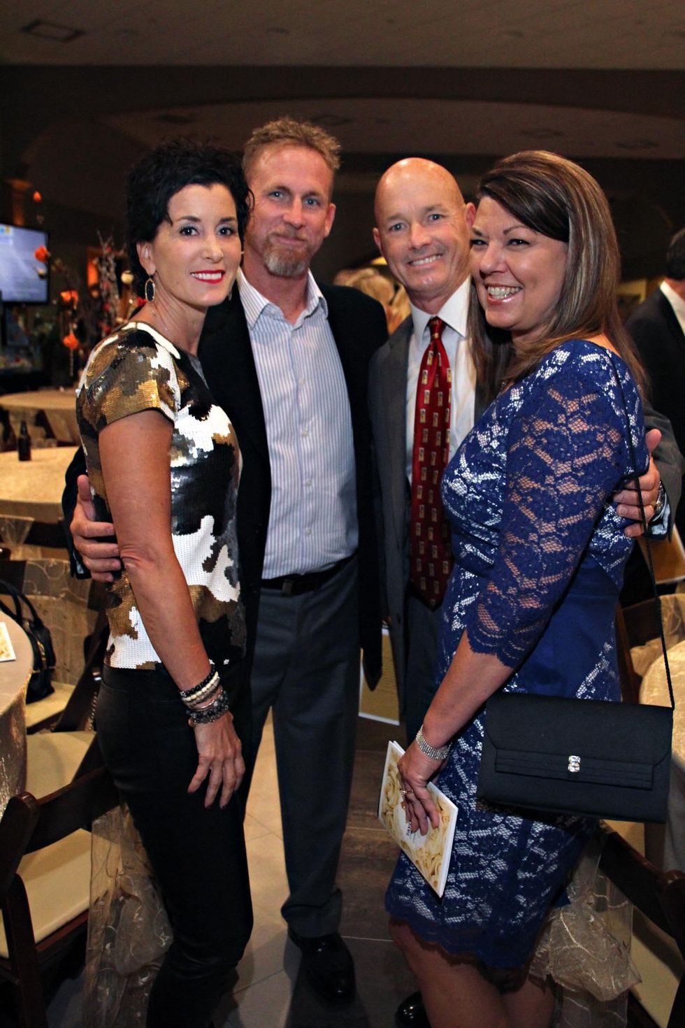 8 Kim and Woody Williams, from left, and Robert and Susan Thomas at the Mercedes-Benz of Sugar Land Cystic Fibrosis Event October 2014