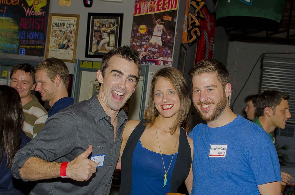 8 Paul Gallant, from left, Hannah Weir and Mitchell Cash at the Bear Bryant Awards young professionals party October 2014