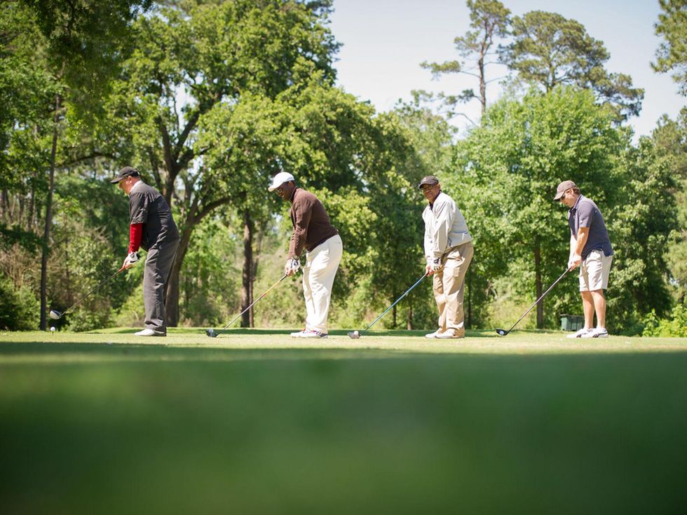 8 Ronnie D. Meaux, from left, Carlos Rainer, Michael Harris and Mark Worden at the Children's Museum Spring Golf Classic April 2014
