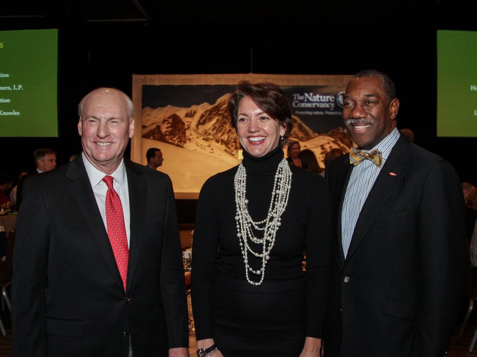8 Scotty Arnoldy, from left, Laura Huffman and Earl Ship at the Nature Conservancy luncheon November 2013