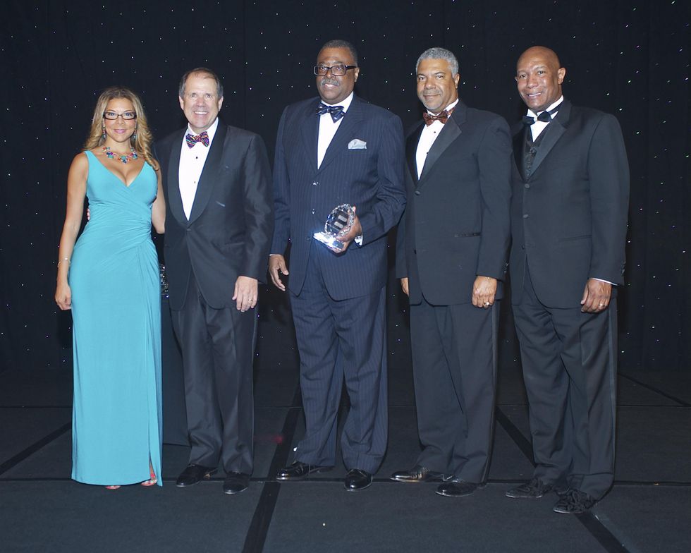 88 Krystin Page, from left, Ric Campo, Herman Burroughs, Judson W. Robinson III and Cary Yates at the Houston Area Urban League Gala June 2014