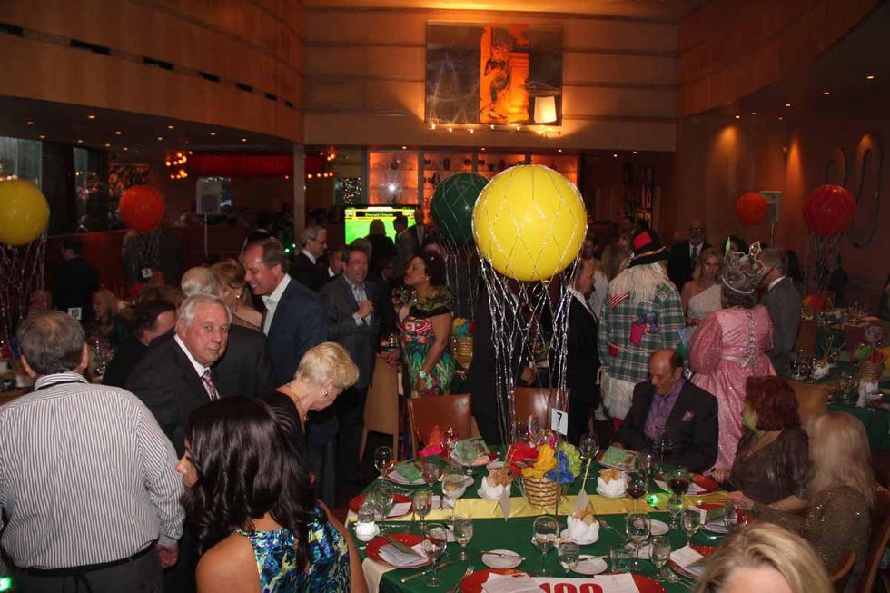 8S The crowd at Tony's at the Emerald City ESCAPE Celebrity Serve Benefit April 2014