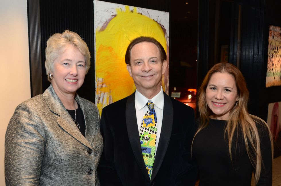 9 47 Mayor Annise Parker, left, with Lester Marks and Dr. Penelope Marks at the Rick Lowe Party December 2014