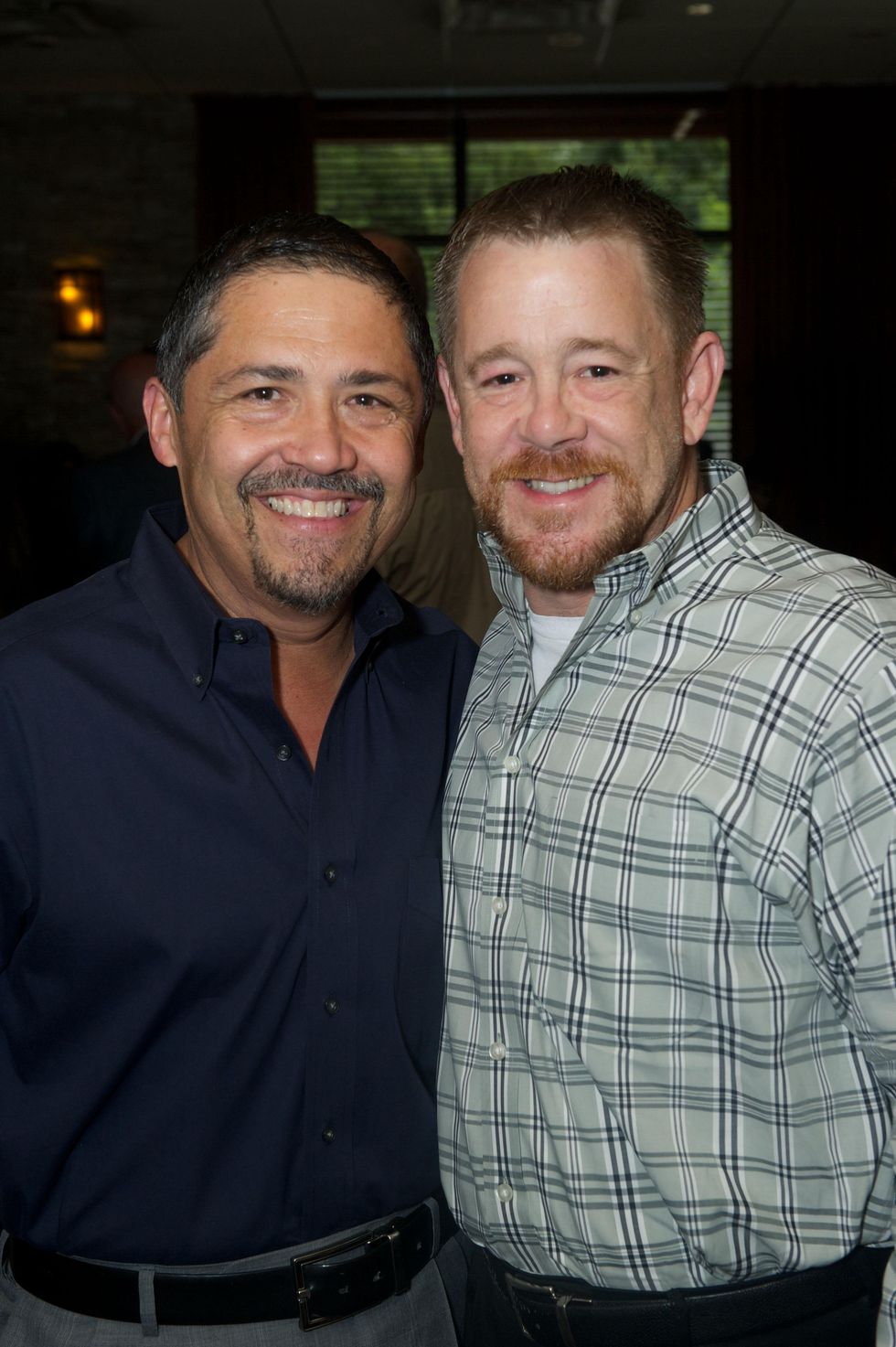 9 Bruce Padilla, left, and Shelby Kibodeaux at the Holly Rose Ribbon Shades of Roses kick off party July 2014