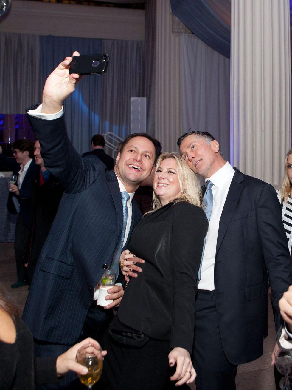 9 David Solis, from left, Libby Cagle and Gregory Fourticq Jr. at the Night Circus party January 2014
