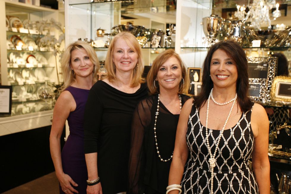 9 Lisa Garcia, from left, Susan Wagner, Belinda Phelps and Regina Garcia at Events' Shop With Heart Card launch party April 2014