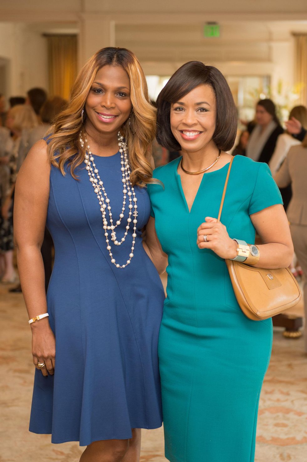 9 Nicole West, left, and Gina Gaston at the Children's Museum Friends Families Luncheon March 2015