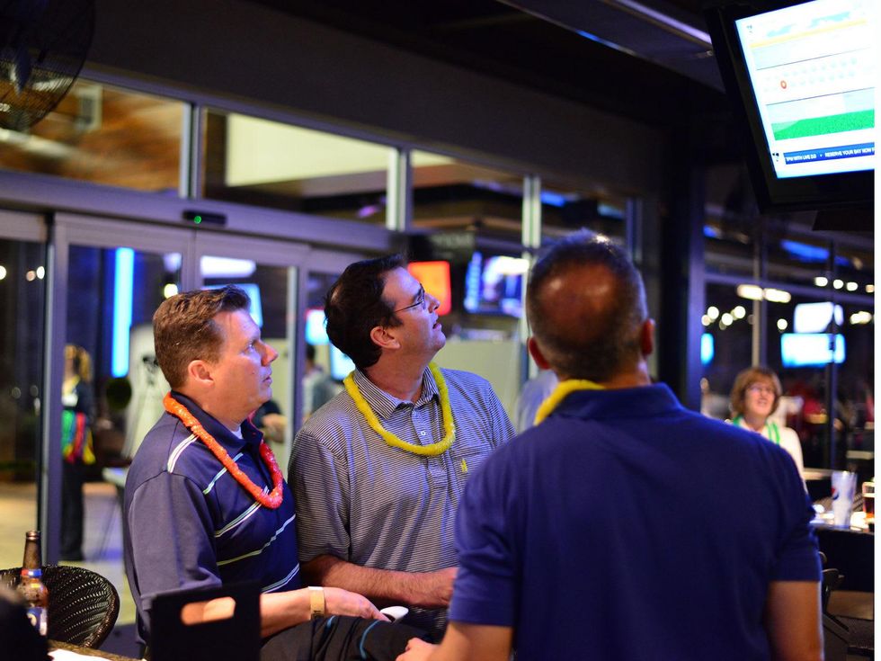 9 our 21 Todd Farquharson, from left, Drake Schunck and John Granato at the Literacy Advance Reader Cup February 2014
