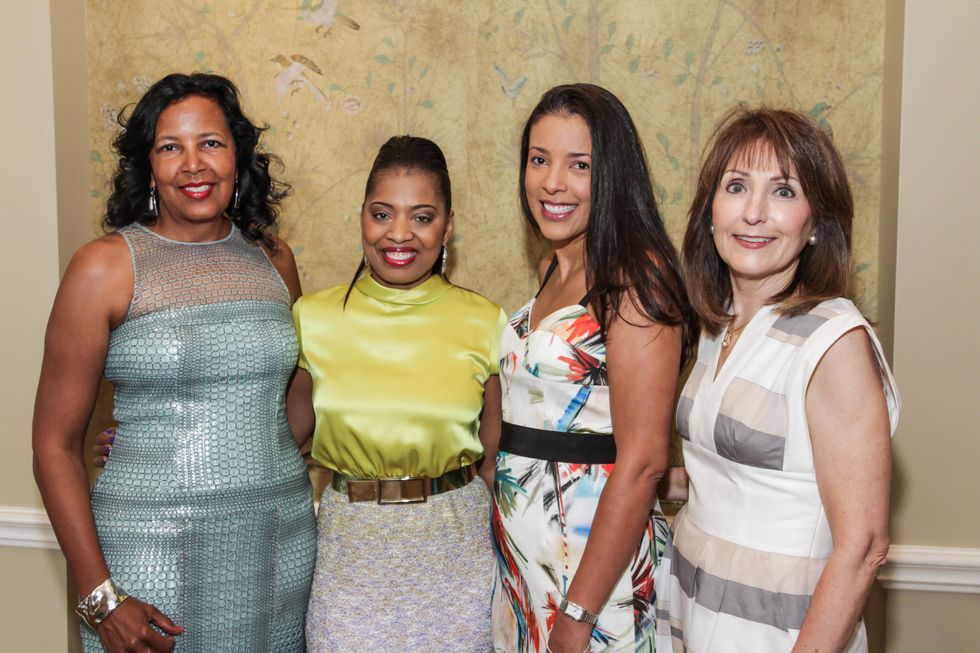 9391 Paige Cawthon, from left, Shawntell McWilliams, Dameria Curry-Boston and Terri Phillips at the National Kidney Foundation luncheon May 2014