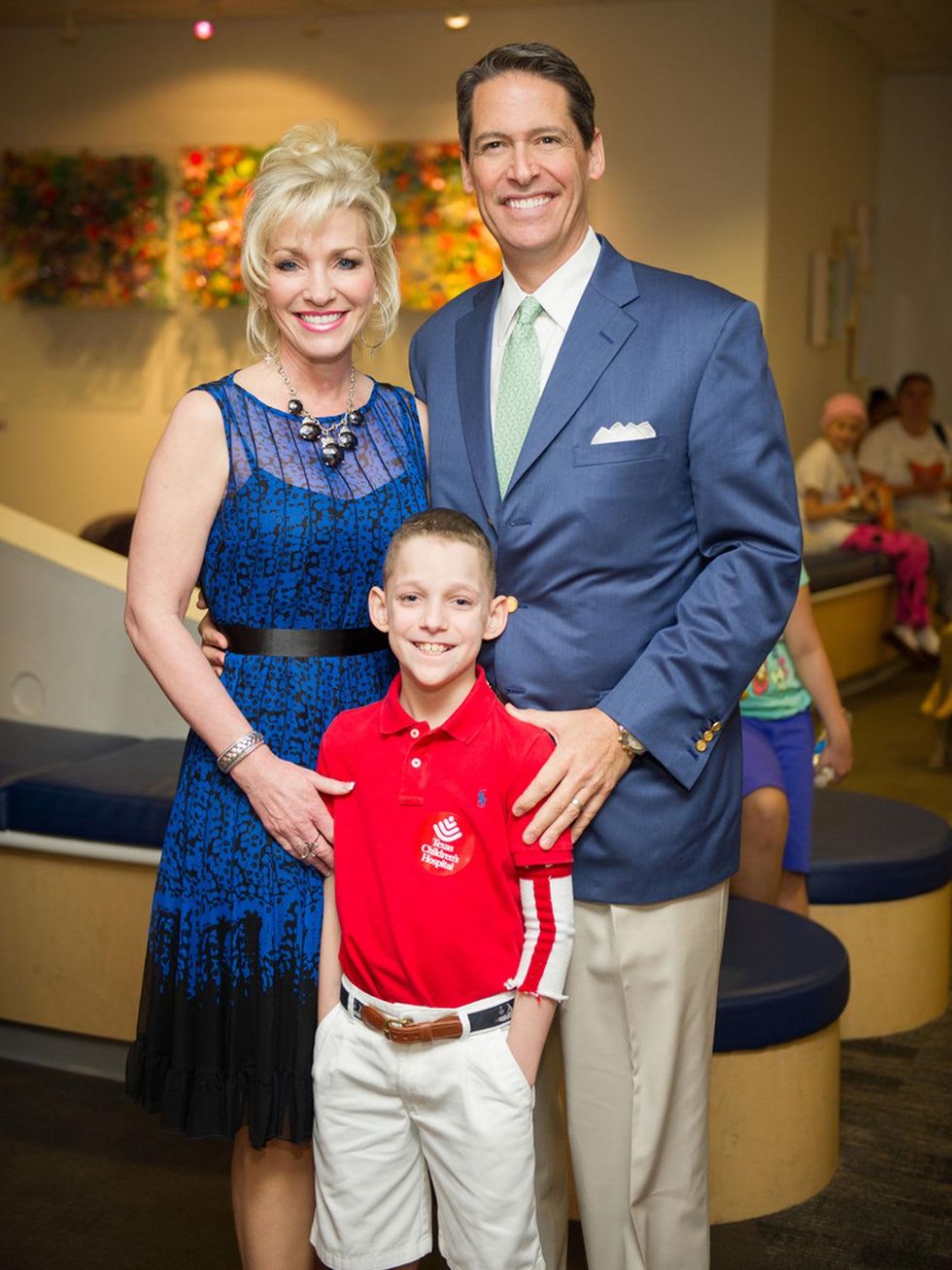9527 Laurie and Chris DeClaire with their son, Patrick at the Lester and Sue Smith Clinic dedication at Texas Children's Hospital May 2014