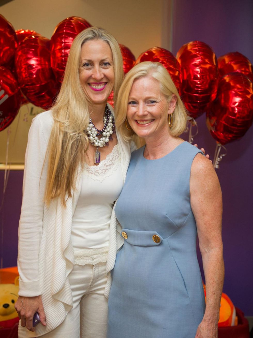9546 Anita Kruse, left, and Trish Morille at the Lester and Sue Smith Clinic dedication at Texas Children's Hospital May 2014