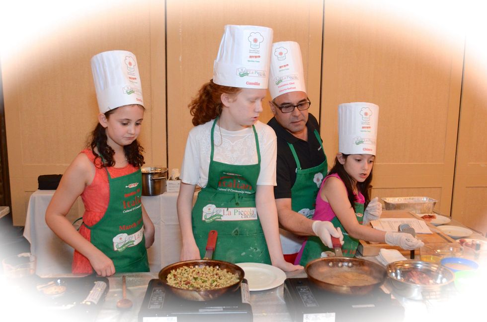 96 The Spiedino Team from left Sadie Weller, Camilla Manning, Executive Chef Alberto Baffoni and Chiara Cattano at Tutti ai Fornelli de La Piccola Cucina March 2015