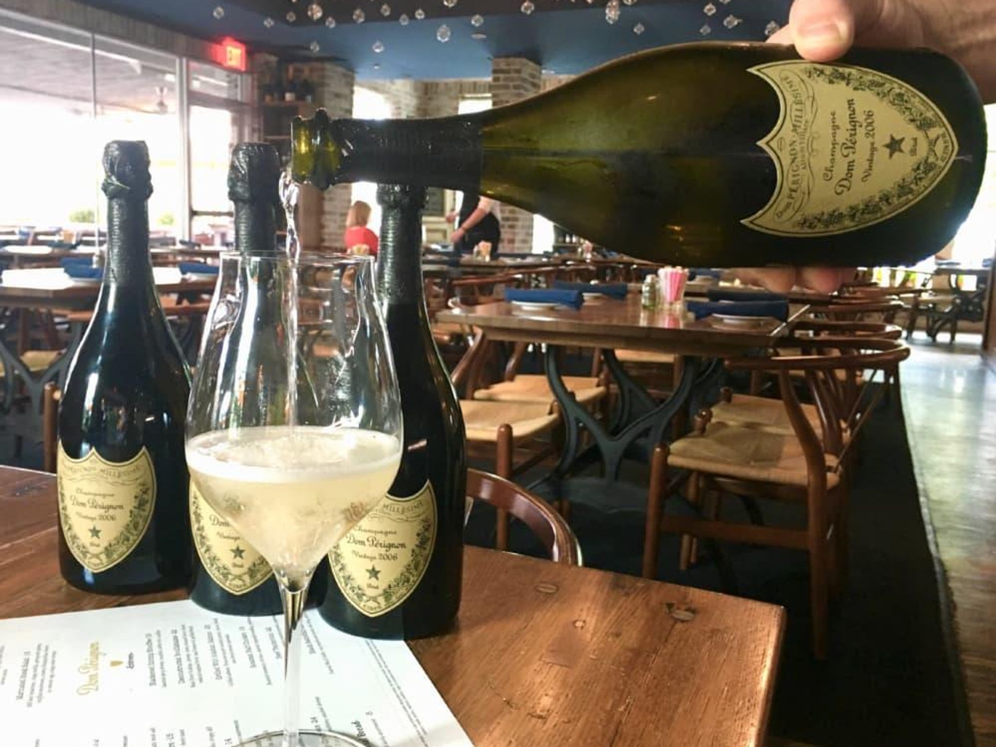 a'bouzy Dom Perignon pour glasses