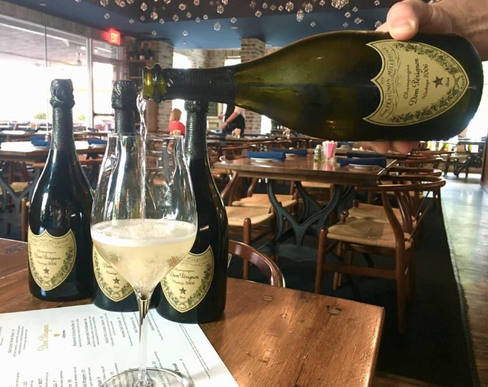 a'bouzy Dom Perignon pour glasses