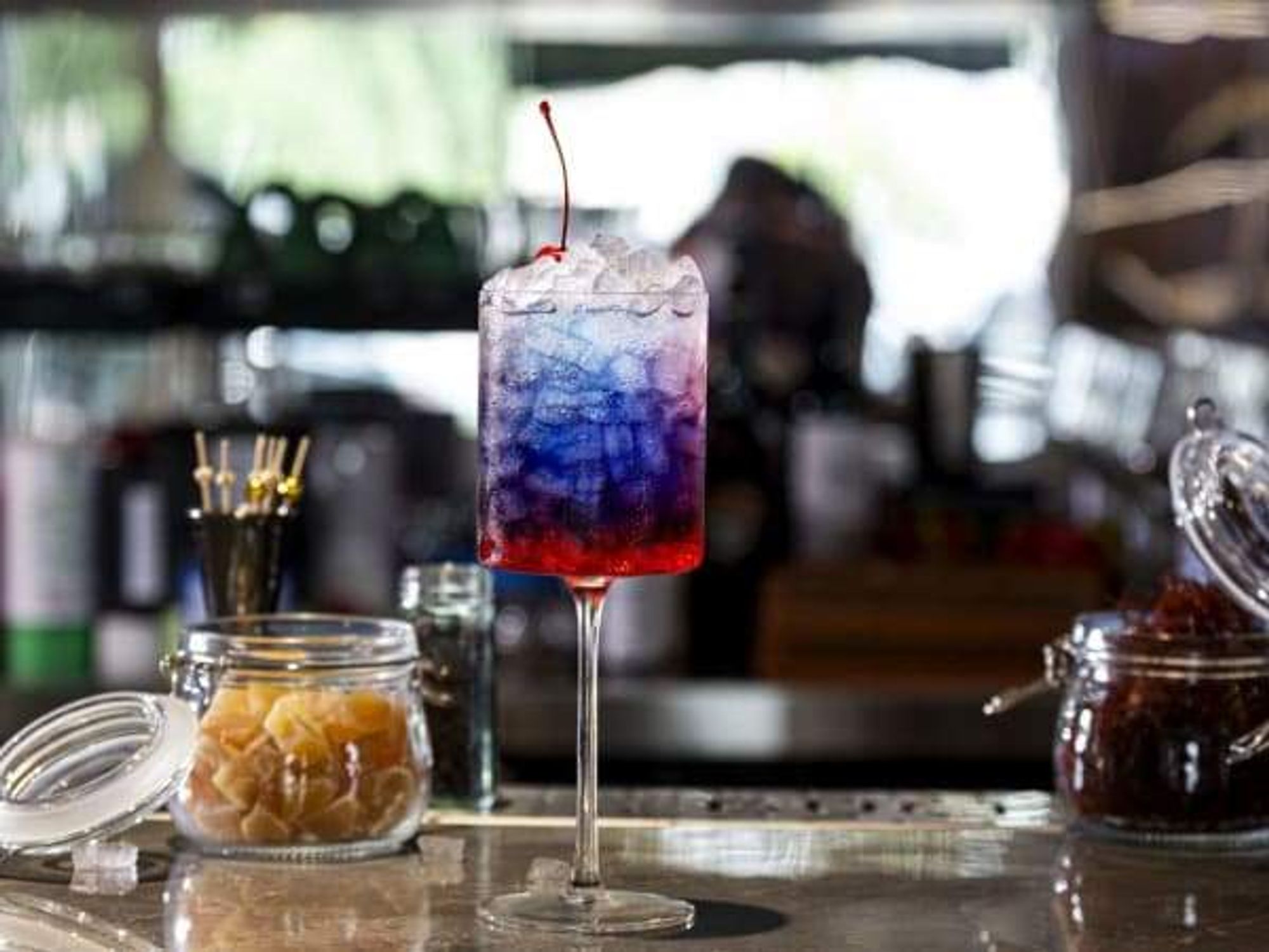 A Dance of Fire and Ice red, white, and blue cocktail at Duck N Bao