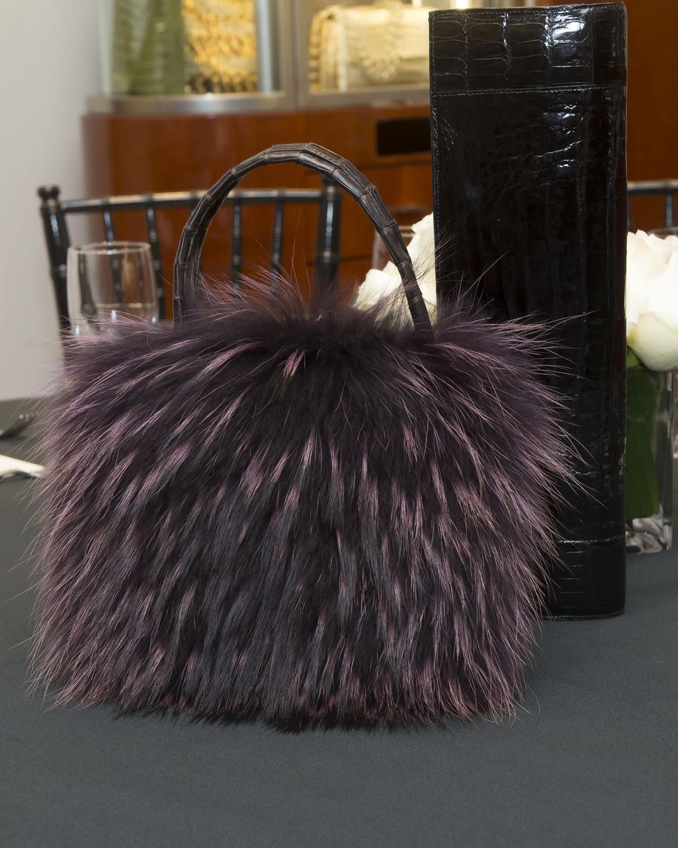 A furry bag at Nancy Gonzalez at Saks Fifth Avenue November 2014