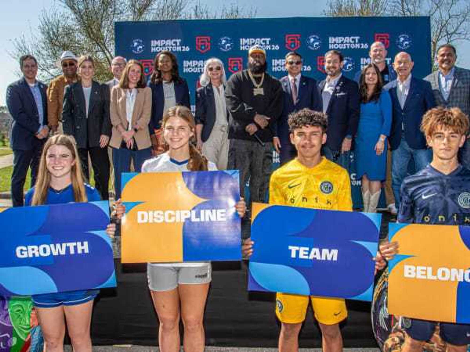 A gathering of Impact Houston '26 members announcing details of the Green Corridor