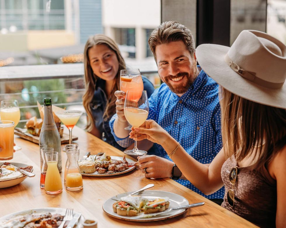 A group of diners enjoying brunch at Haywire